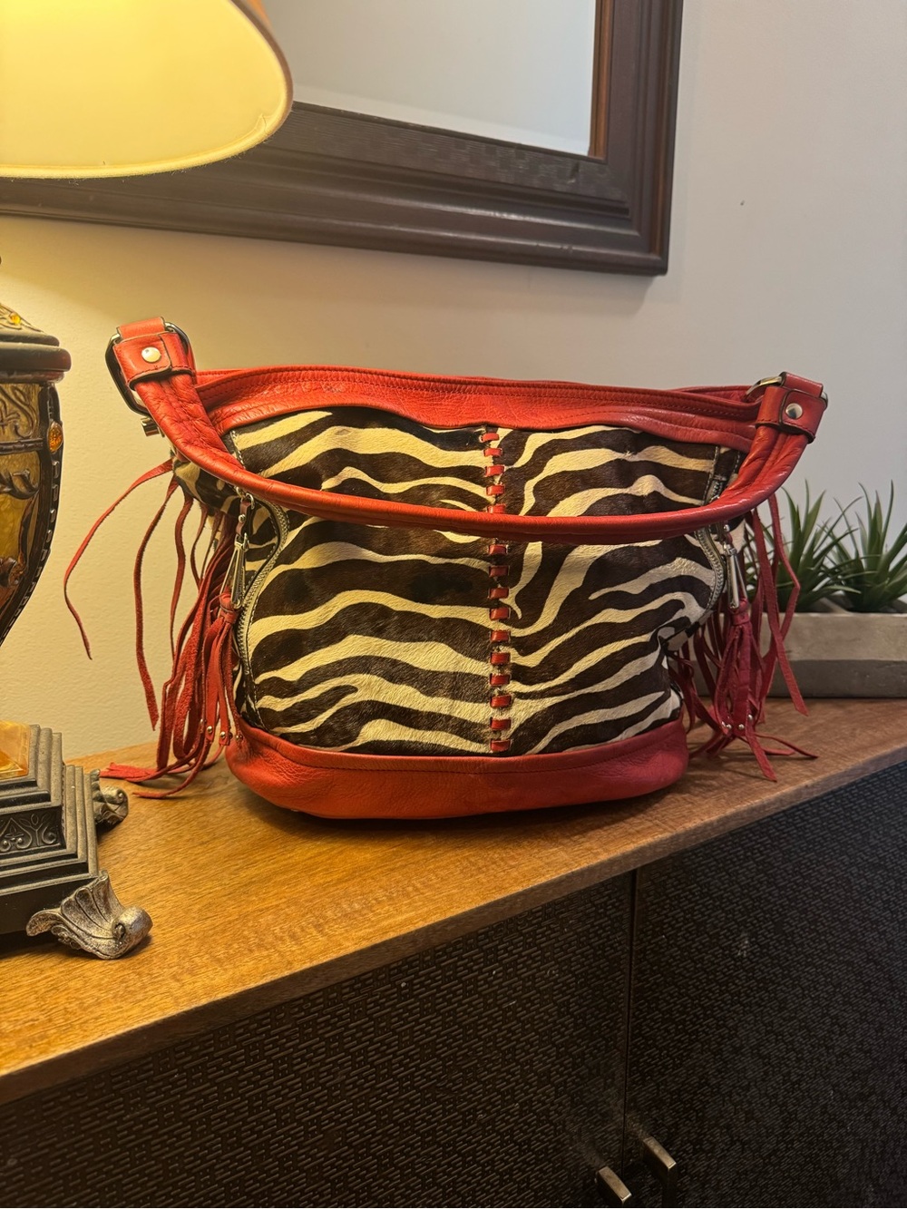 Makowsky red leather and zebra bag